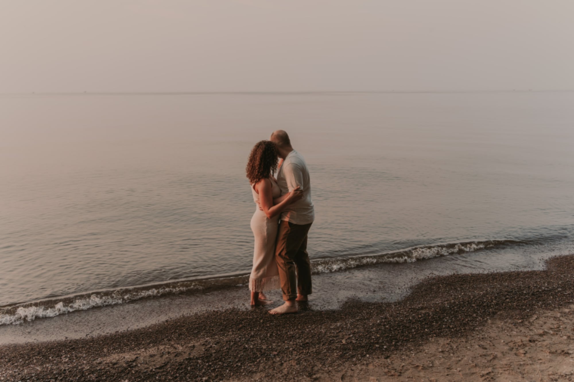 Stephen and Malayna looking at a beach in Rochester